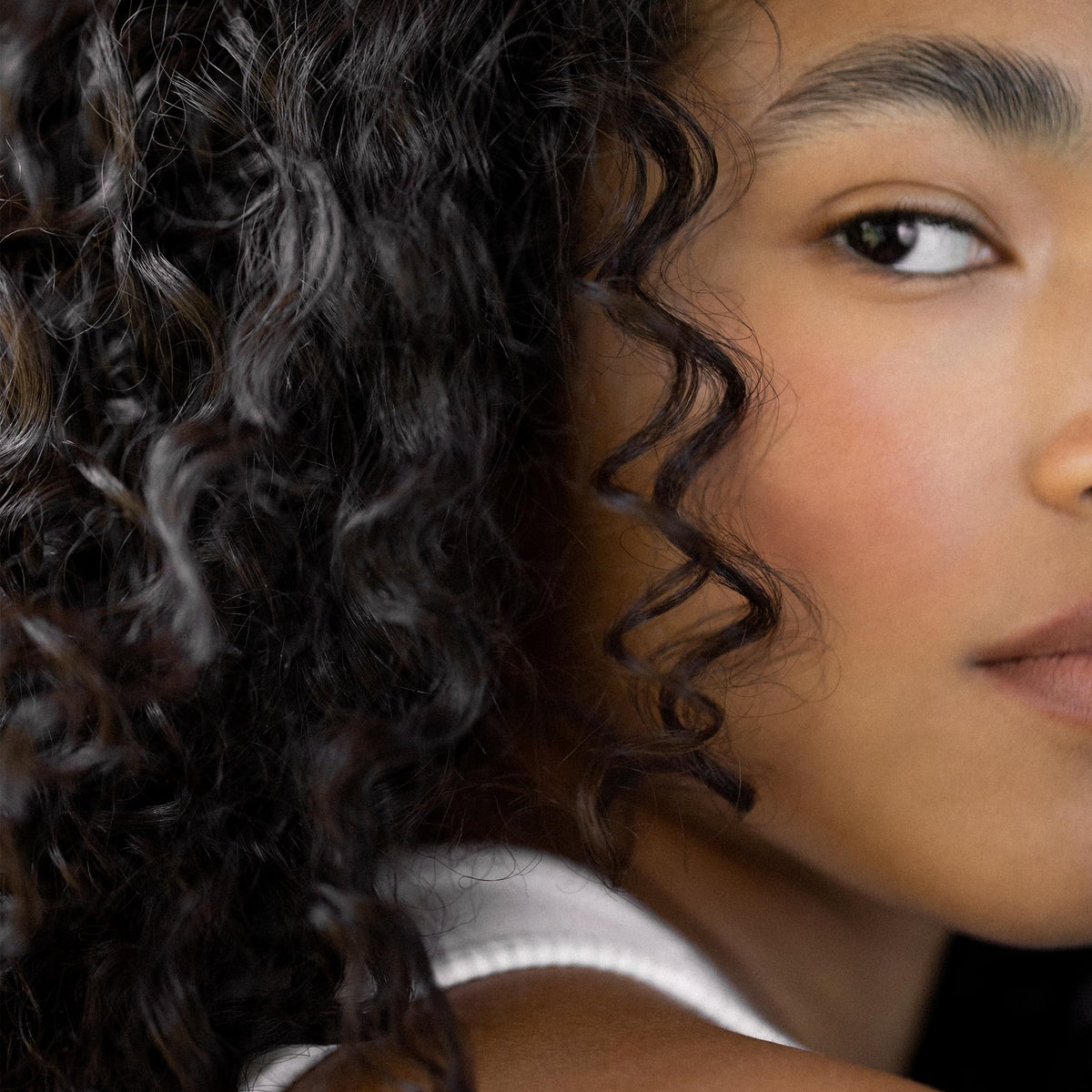 RŌZ before and after hair image showing smoother, strengthened results