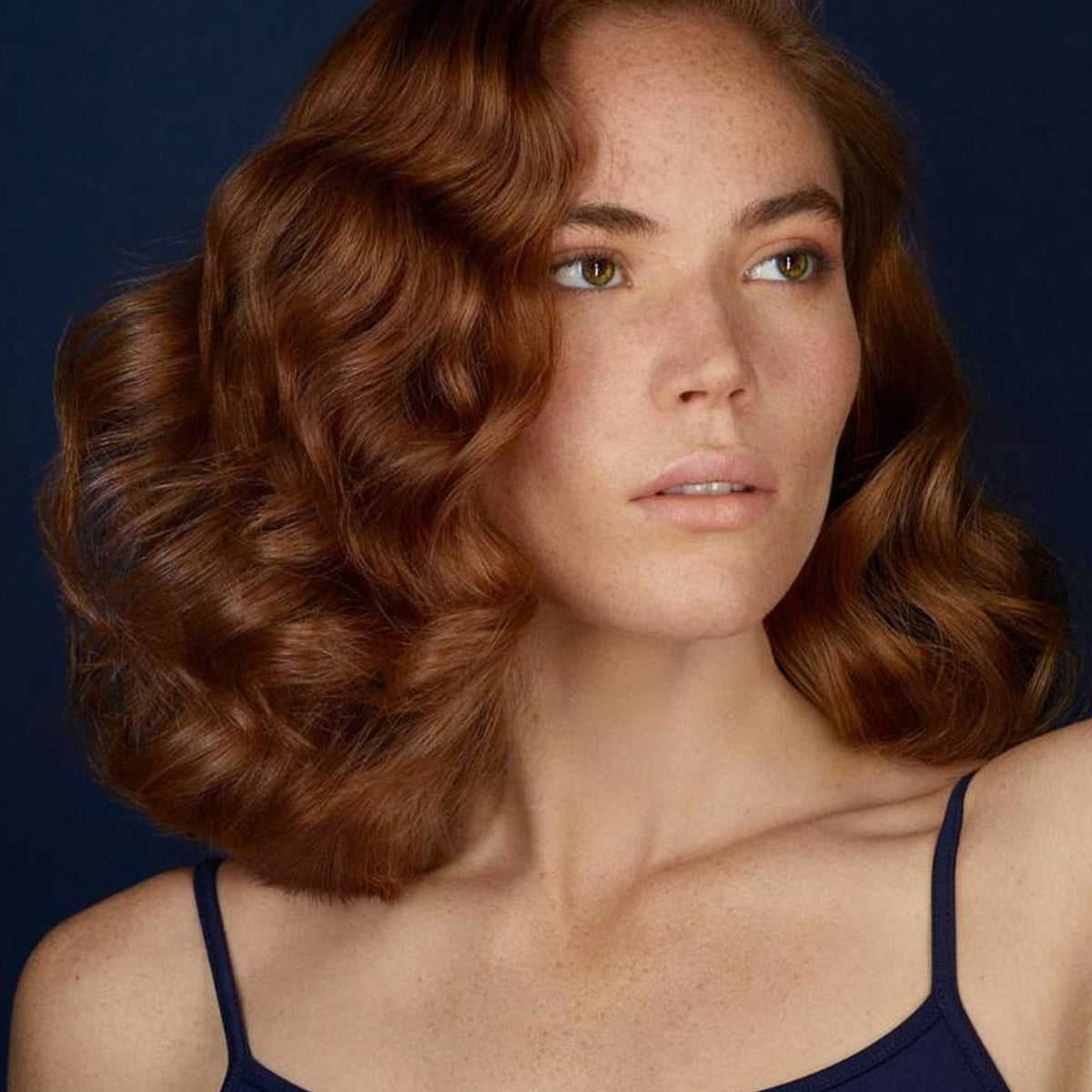 R+Co BLEU conditioner creamy texture close-up for lightweight hydration