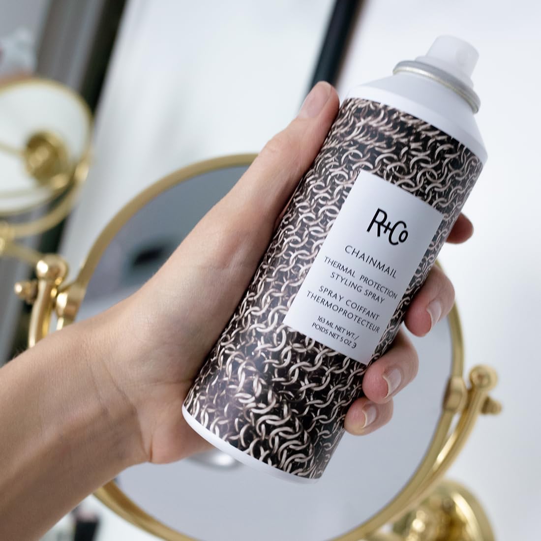 R+Co Chainmail fine mist spray dispersing evenly for full coverage