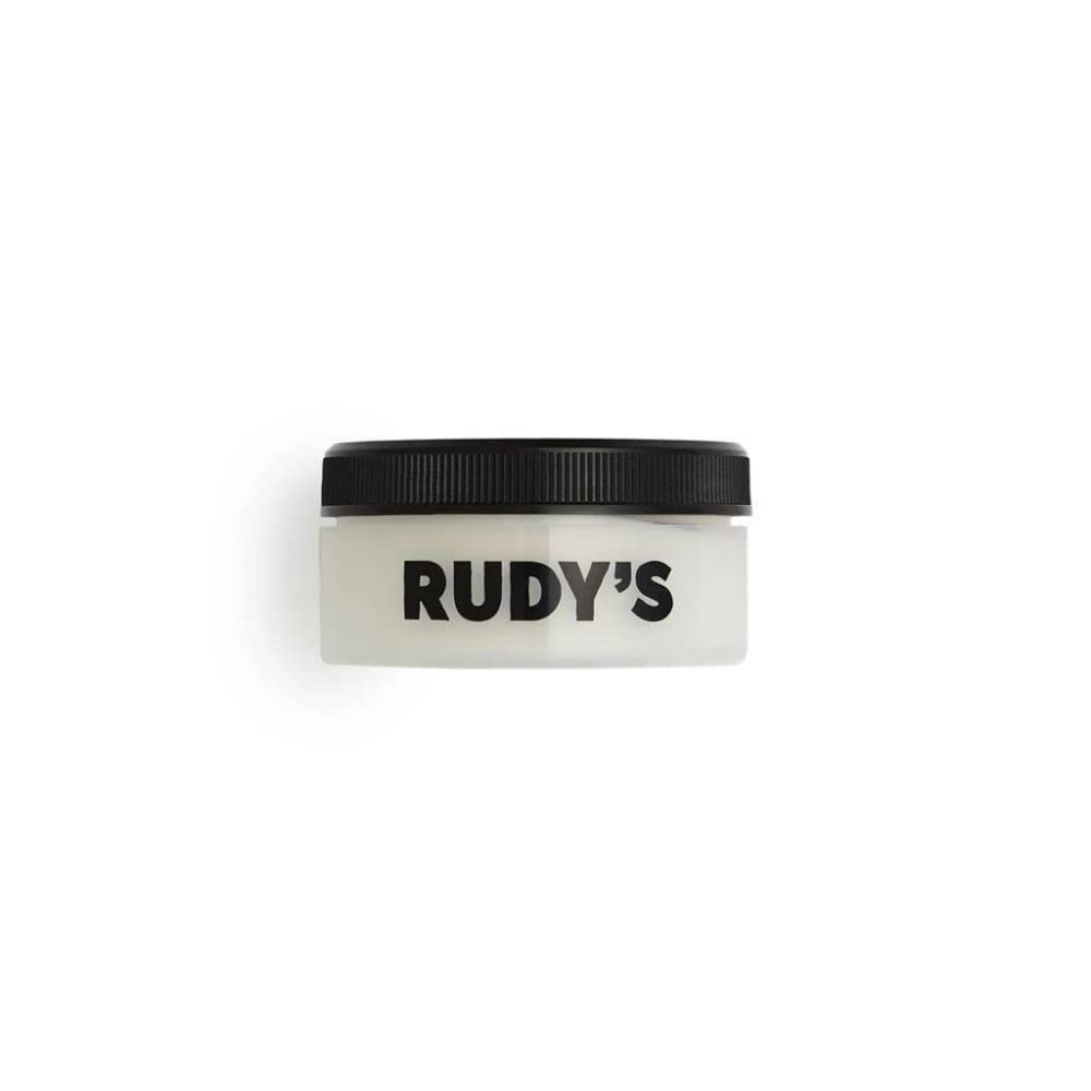 Rudy's matte pomade front jar showing compact travel-friendly styling