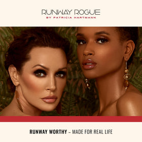 Runway Rogue gloss in a makeup bag lifestyle scene for everyday, on-the-go glamour