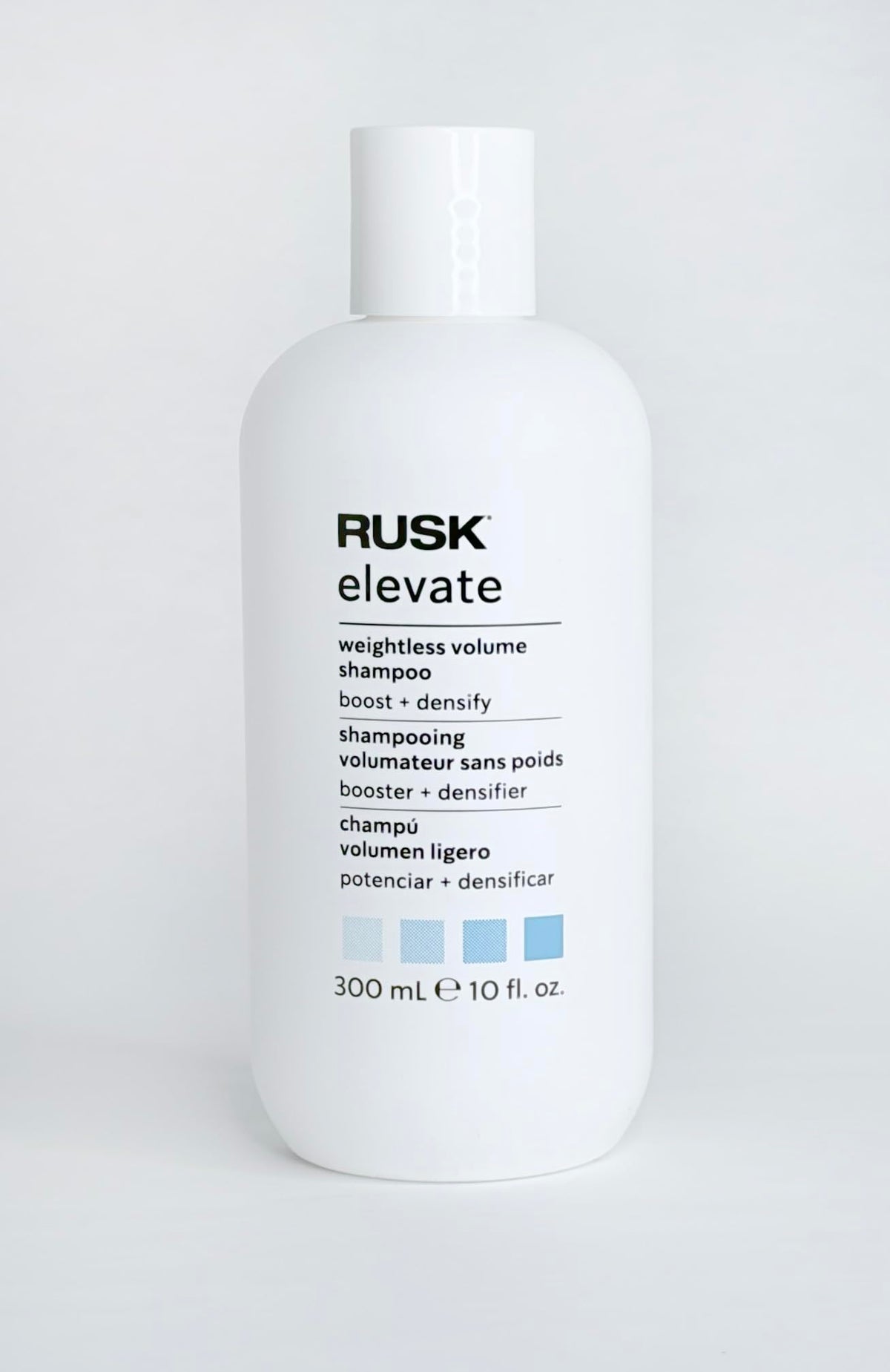 RUSK shampoo in use while blow-drying adding visible lift and long-lasting body