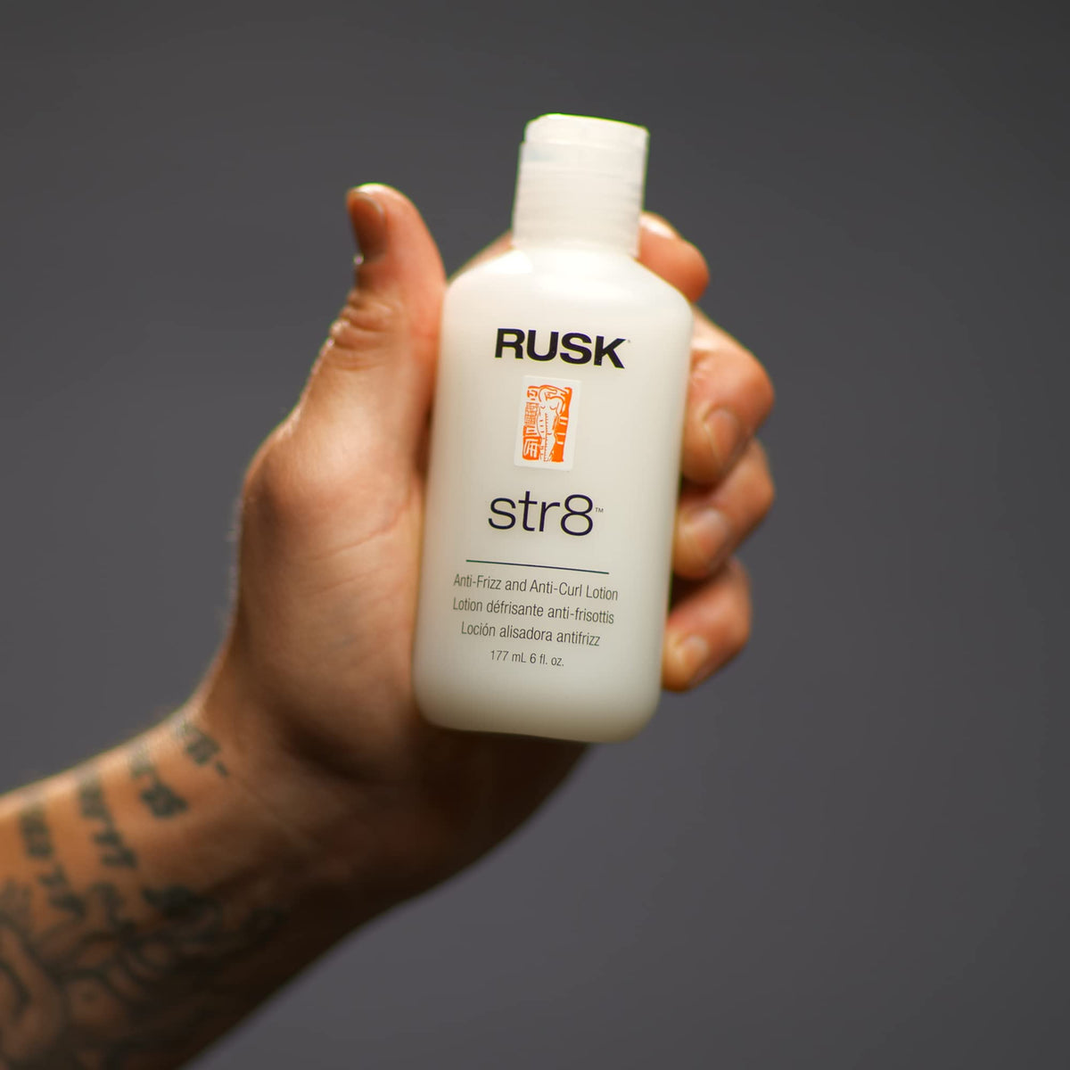 RUSK Str8 applied while styling, blow-dry technique for smoother hair