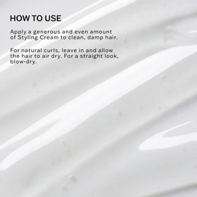 SACHAJUAN styling cream dispensed on hand demonstrating easy spreadability