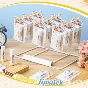 Sacubee lip balm held in hand to show compact size and pocket-friendly convenience