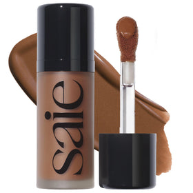 Saie front packaging of Dew Bronze stick showing compact design and shade label