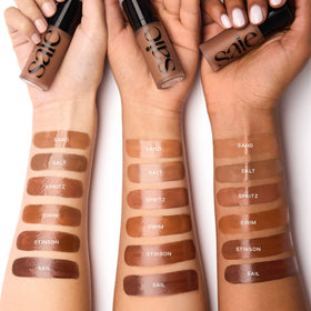 Saie product applied on forehead and cheekbones illustrating sun-kissed glow