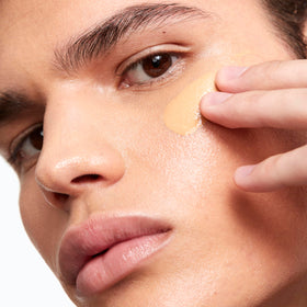 Saie texture close-up of dewy serum-pigment blend, shows luminous finish