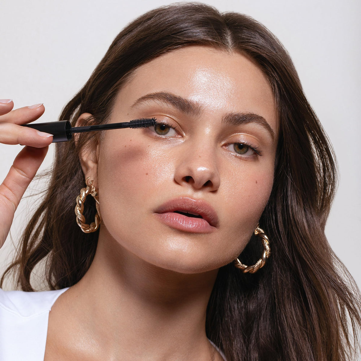 Saie mini mascara ingredients label highlighting beeswax, shea butter, and arginine benefits