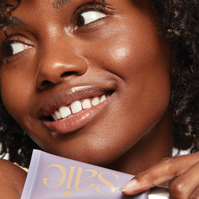 Saie application on hand showing sheer finish and instant hydration benefit