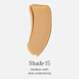 Saie texture close-up of liquid serum-tint highlighting dewy, blendable finish