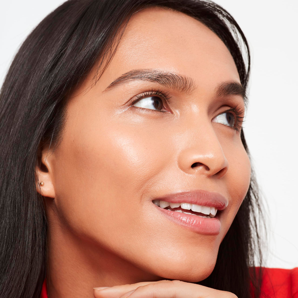 Saie texture swirled on skin displaying hydrating, dewy finish benefit