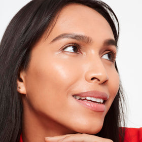 Saie texture swirled on skin displaying hydrating, dewy finish benefit