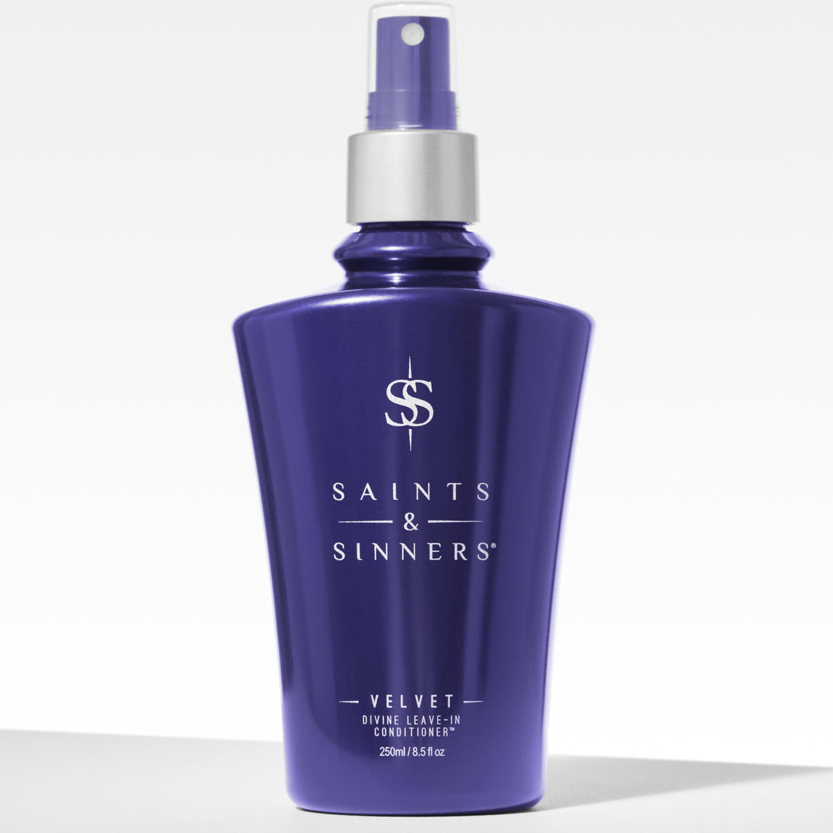 Saints & Sinners bottle next to common items for size, clarifies product volume