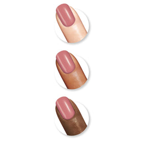 Sally Hansen bottle held near ruler for scale showing true size benefit