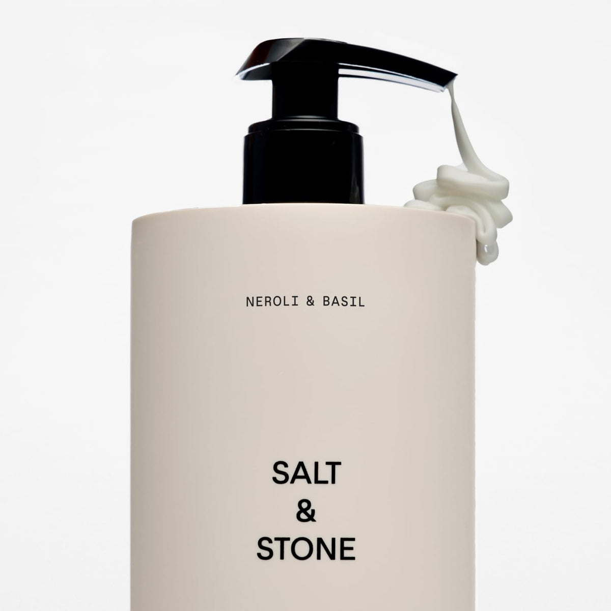 Salt & Stone label detail emphasizing vegan, cruelty-free certifications and clean ingredients