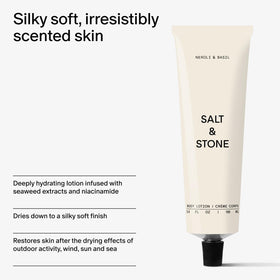 Salt & Stone bottle next to passport showing 3.4 fl oz travel-friendly size