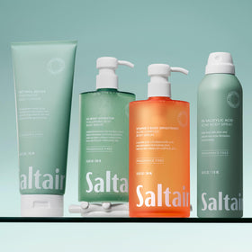 Saltair flatlay with collagen oil showing layering and hydration benefits