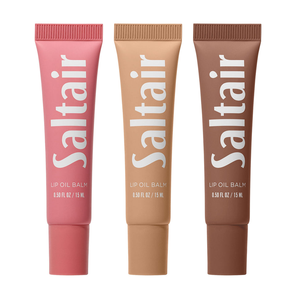 Saltair lip oil balm front view showing compact tube and glossy finish benefit