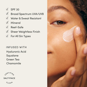 SALTYFACE sunscreen being applied on hand demonstrating easy spreadability
