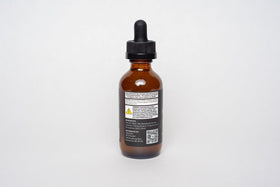 Samson's Apothecary 60mL bottle held in hand showing compact travel-friendly size