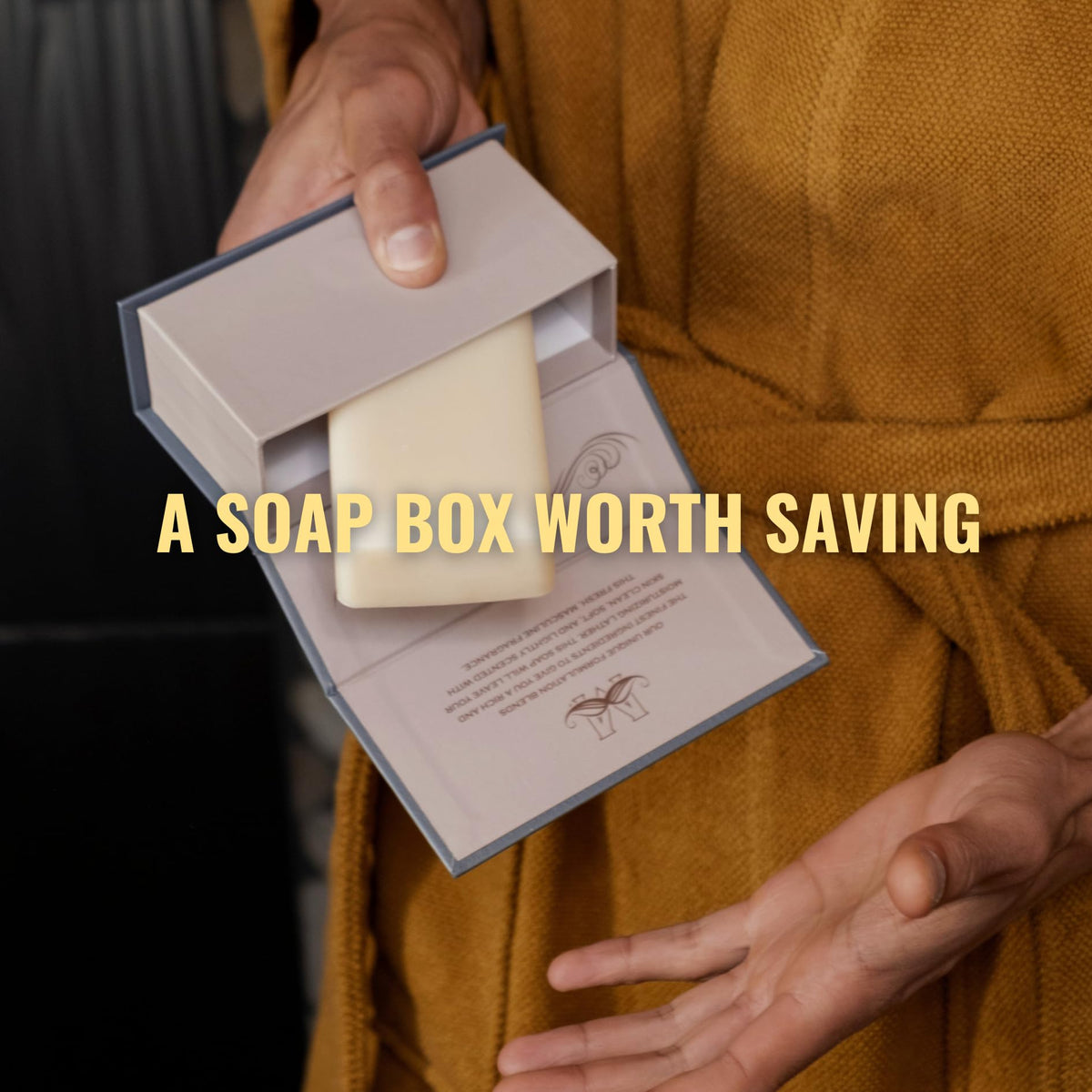 San Francisco Soap Company bar in hand to show compact 2-ounce size and travel convenience