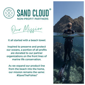 Sand Cloud towel styled in bathroom setting conveying eco-conscious comfort and everyday use