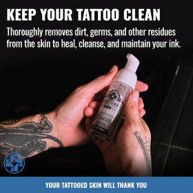 Saniderm bottle staged in a tattoo studio for professional use