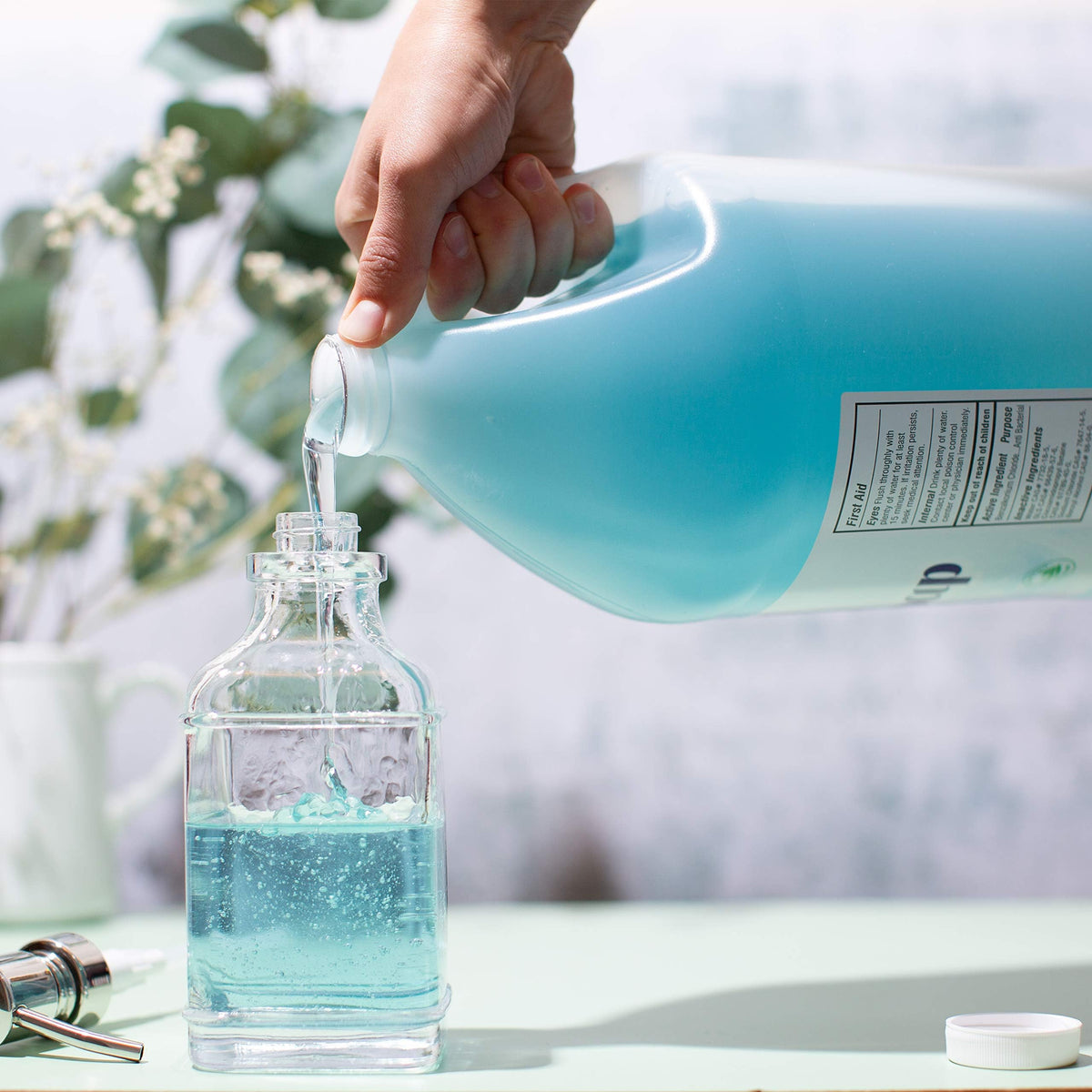 Sanit Silky Clean pump dispensing creamy lather for effective cleansing