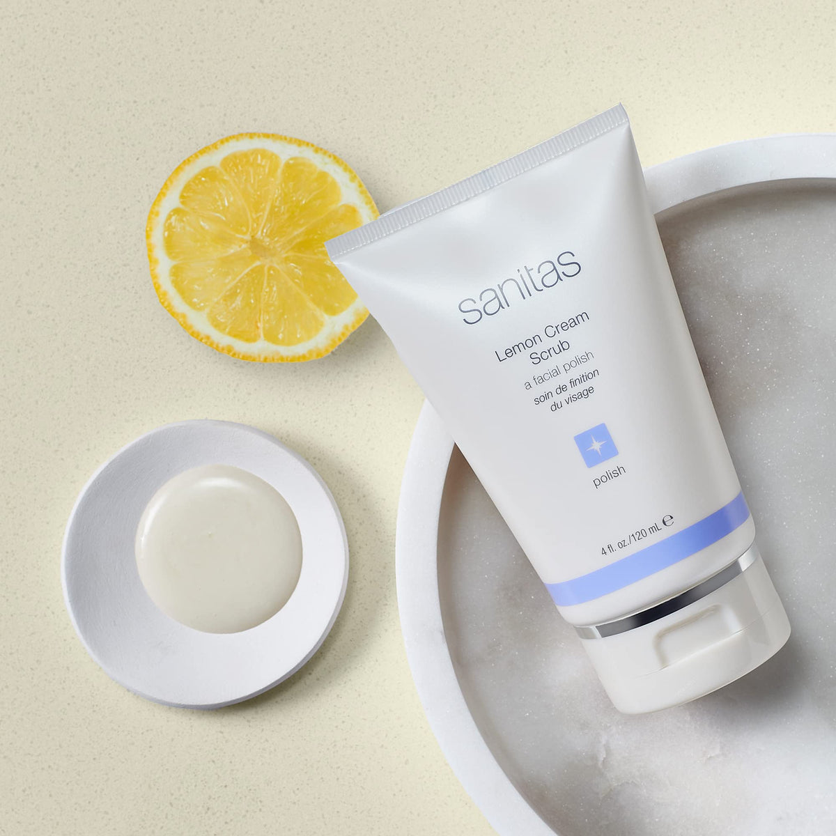 Sanitas texture close-up revealing ultra-fine silica crystals and creamy base for gentle exfoliation benefit