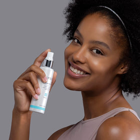 Sanitas spray mist being applied to face for instant hydration boost