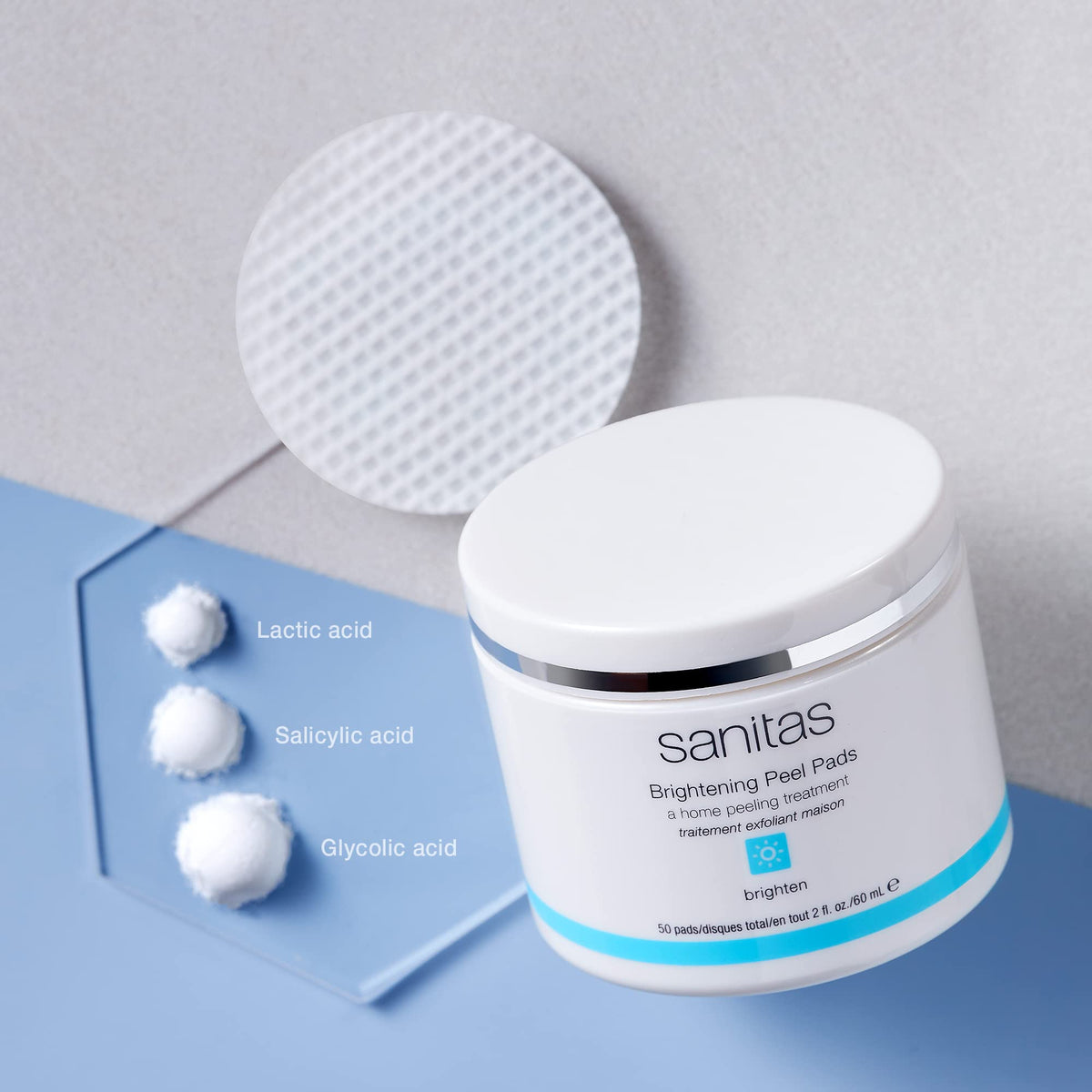 Sanitas close-up of pad texture soaked with solution for effective exfoliation
