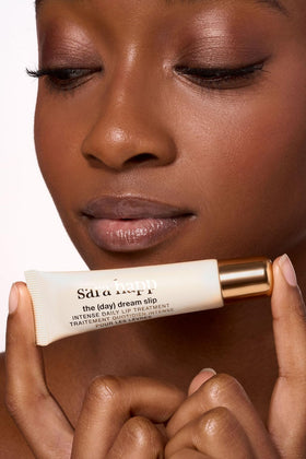 Product being applied from tube in hand illustrating convenient, mess-free use and protection
