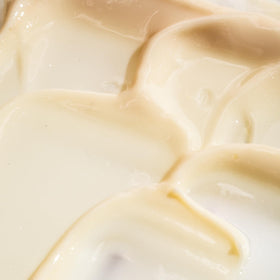 Creamy texture swipe of Sara Happ Dream Slip No2 showing lightweight hydration effect