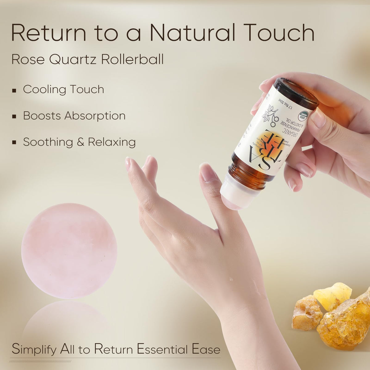Satree rose quartz rollerball closeup showing smooth stone for cooling massage benefit