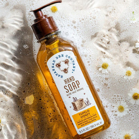 savannah bee company bottle styled in bathroom conveying premium shelf appeal