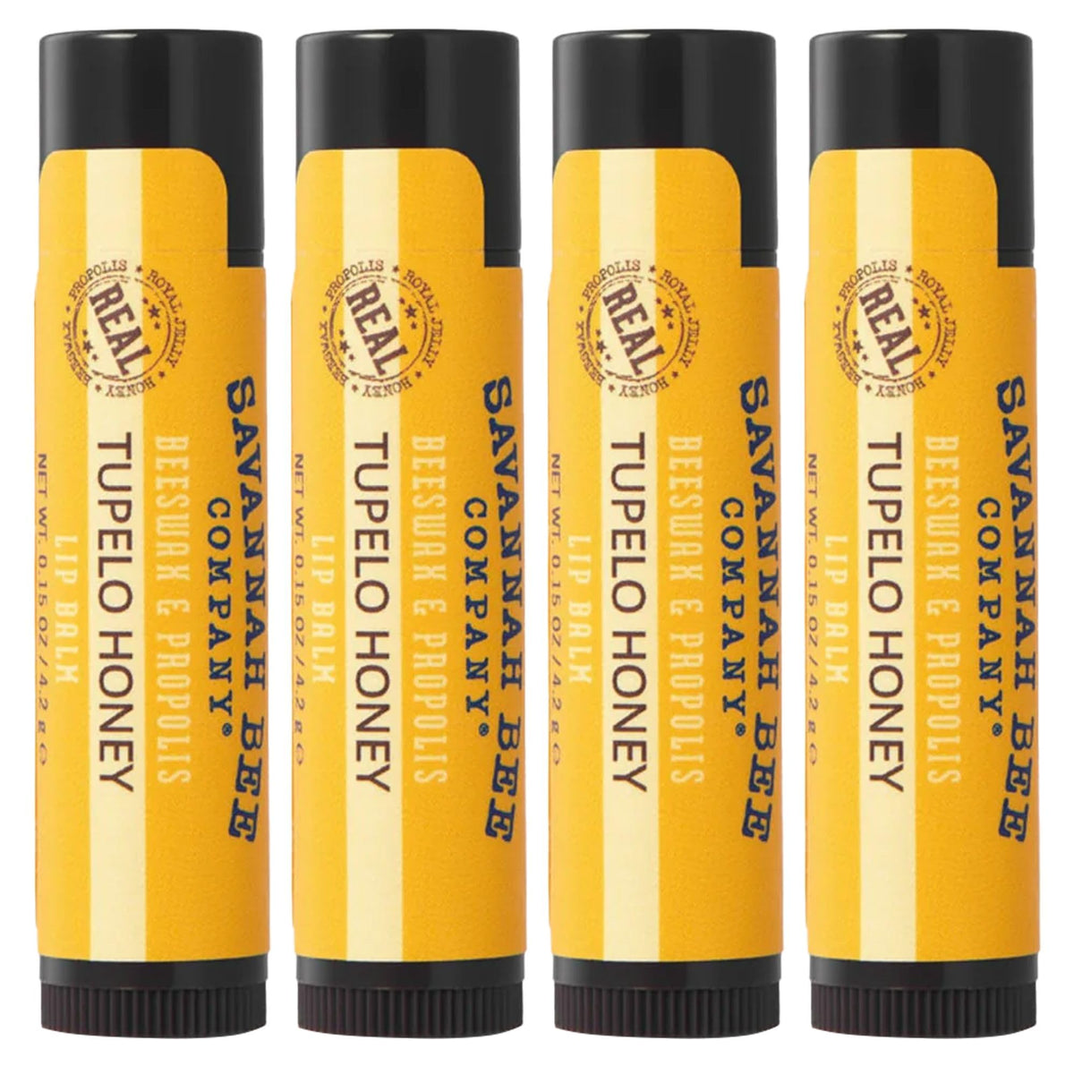 Savannah Bee Company tins front view showing four tupelo honey lip balms and portability benefit