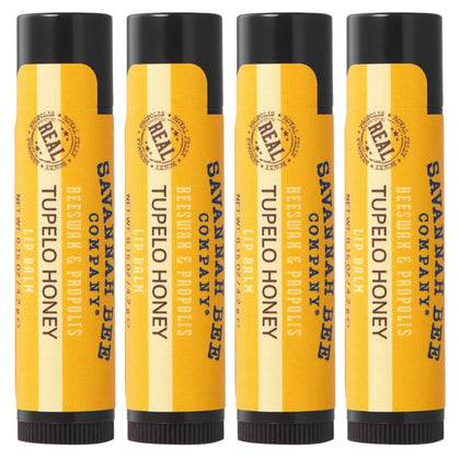 Savannah Bee Company tins front view showing four tupelo honey lip balms and portability benefit