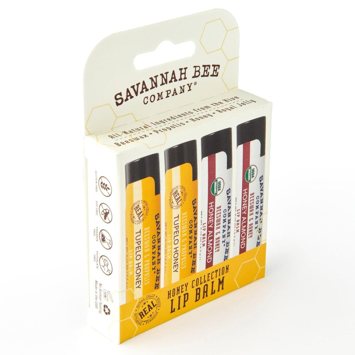 Savannah Bee lip balm next to keys and wallet showing daily convenience