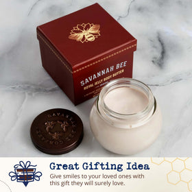 Savannah Bee Company jar held in hand to show compact giftable size
