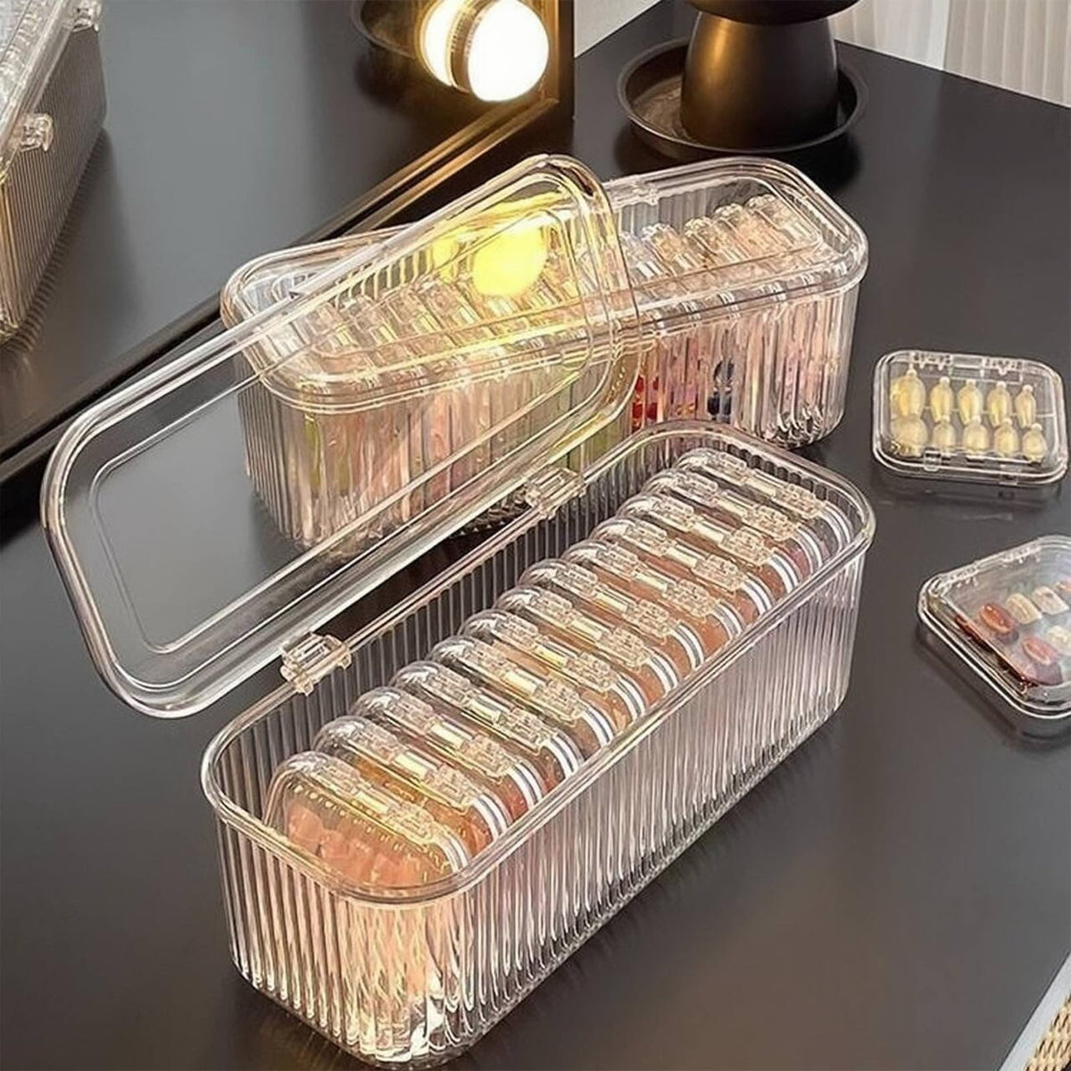 Sawvolker stacked clear boxes on shelf for neat salon display