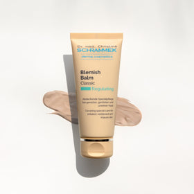 Schrammek blemish balm in-hand application demonstrating coverage control benefit