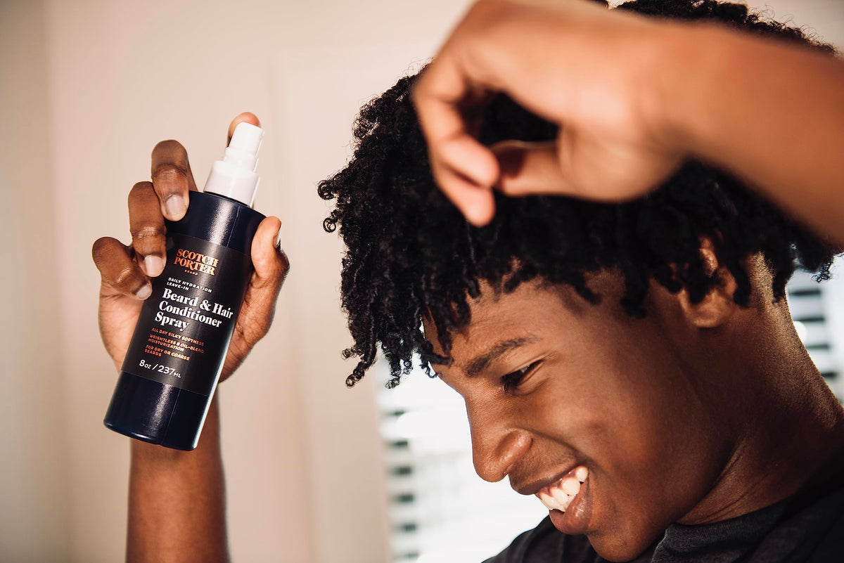 Scotch Porter being sprayed into wet hair to show quick detangling benefit