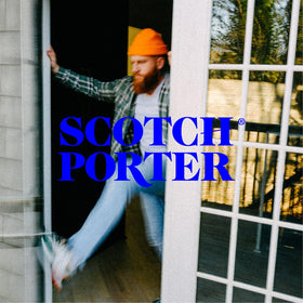 Scotch Porter bottle on bathroom vanity conveying daily grooming routine