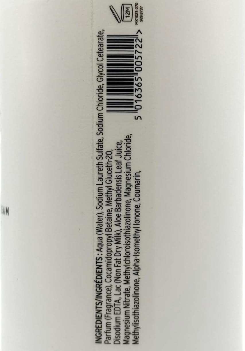 Scottish Fine Soaps bottle beside hand to show size and one-litre economical benefit