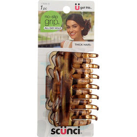 Scunci in use half-up style demonstrating secure hold and easy styling