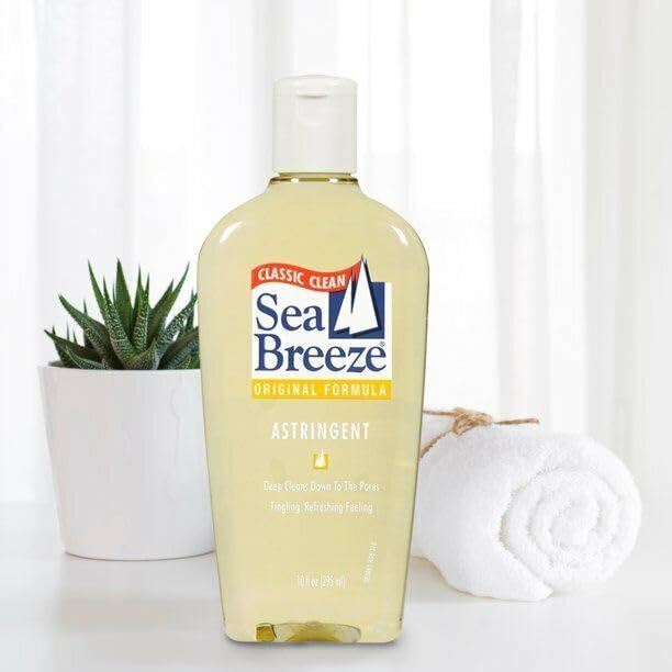 Seabreeze bottle in hand for scale, illustrating 10 ounce size and travel convenience