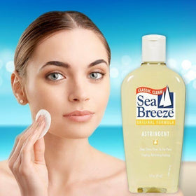 Seabreeze bottle next to hand showing 10 fl oz scale to visualize product size
