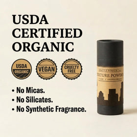 Seattle Pomade Co. label close-up highlighting certified organic ingredients benefit