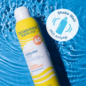 Seaweed Bath Co. spray application at beach demonstrating water-resistant protection benefit